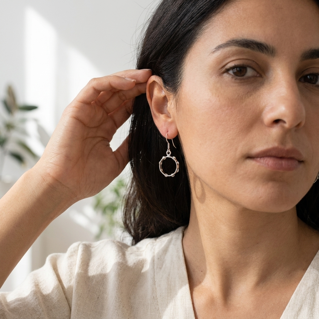 panderete boucle de oreilles
